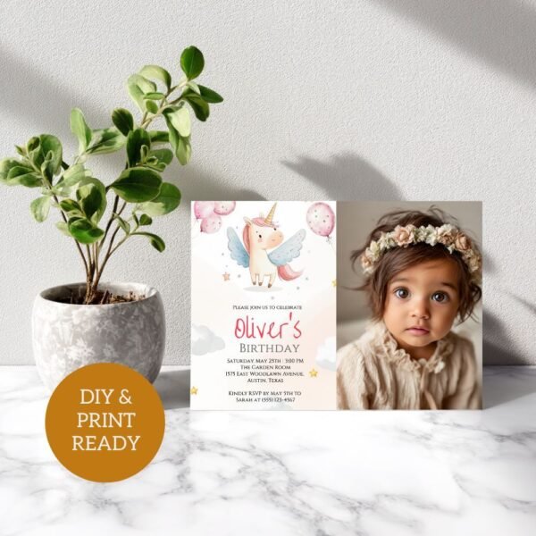 Printable unicorn birthday invitation card with toddler photo on marble background.