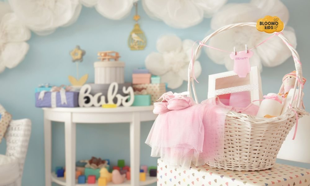 White baby gift basket with pink clothes in a pastel nursery setting.