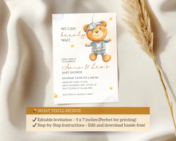 Editable space-themed teddy bear baby shower invitation on cream fabric background.