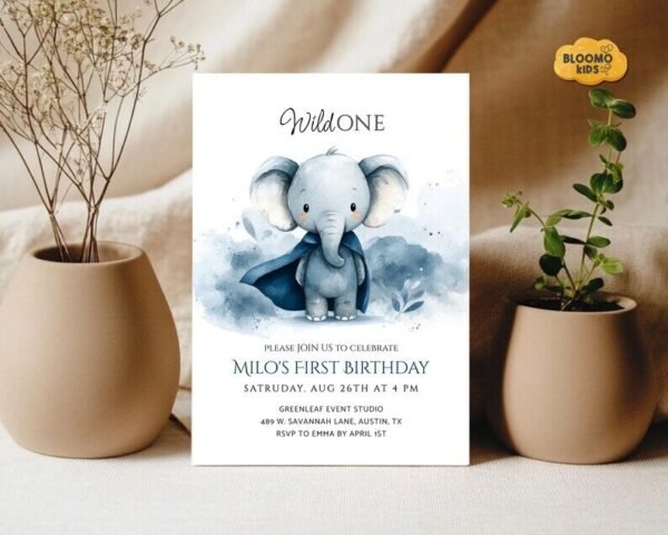 Watercolor elephant first birthday invitation with neutral decor.